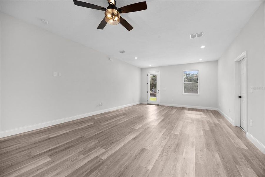 Spacious, unfurnished interior of a new home in , Port Charlotte (Image 32).
