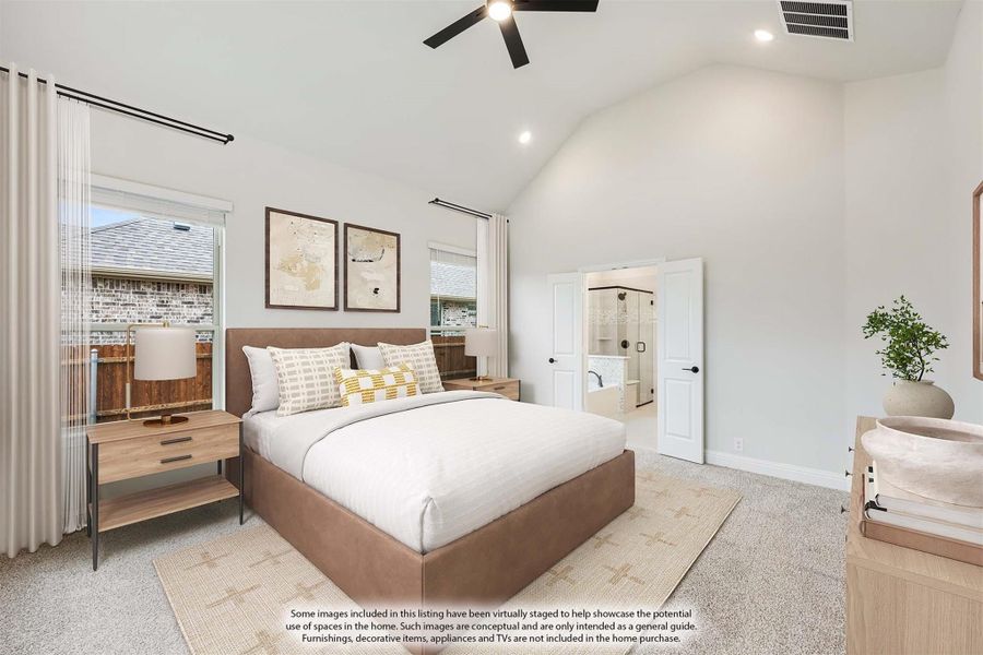 Master bedroom with vaulted ceiling, ceiling fan, carpet flooring, and ensuite bathroom doorway visible