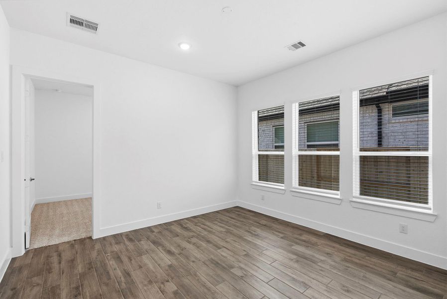 Spacious, unfurnished interior of a new home in Meridiana, Manvel (Image 26).