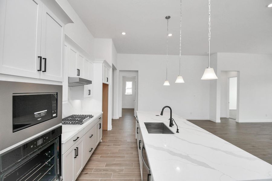 Furnished interior view inside a new home in Arabella on the Prairie: Heritage Collection, Booth (Image 3).