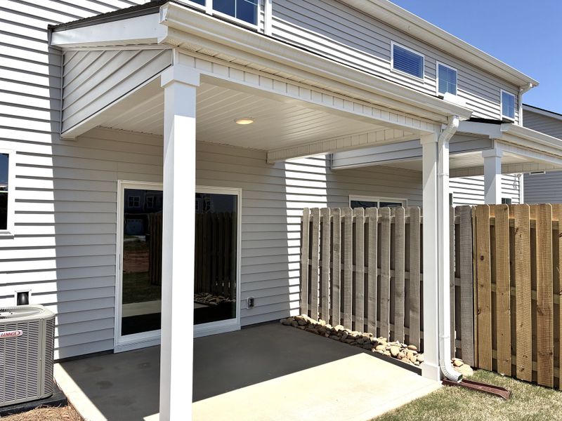 Front exterior of a new home in Holly Ridge, Greenville, SC, highlighting curb appeal (Image 15). Front exterior of a new home in Holly Ridge, Greenville, SC, highlighting curb appeal (Image 15).