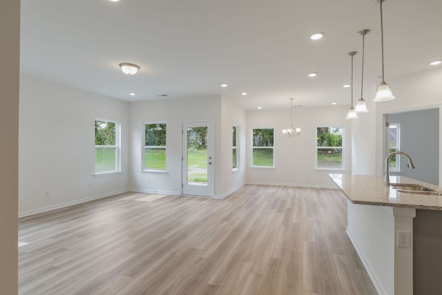 Open living area! Lots of windows to add in natural lighting!