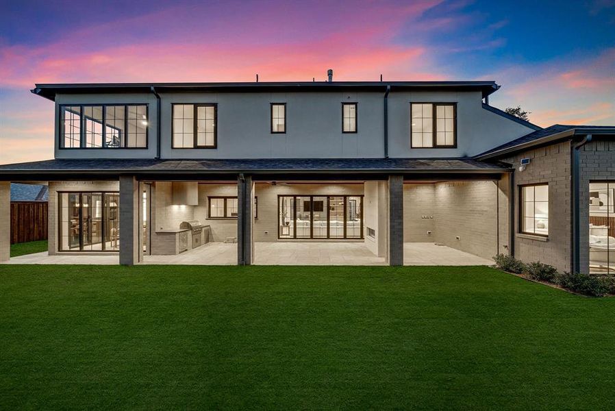 Back of property with a patio and brick siding Back of property with a patio and brick siding