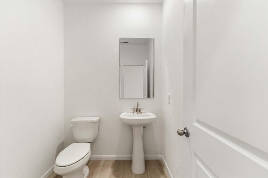 Furnished interior view inside a new home in Sunterra, Katy (Image 7).