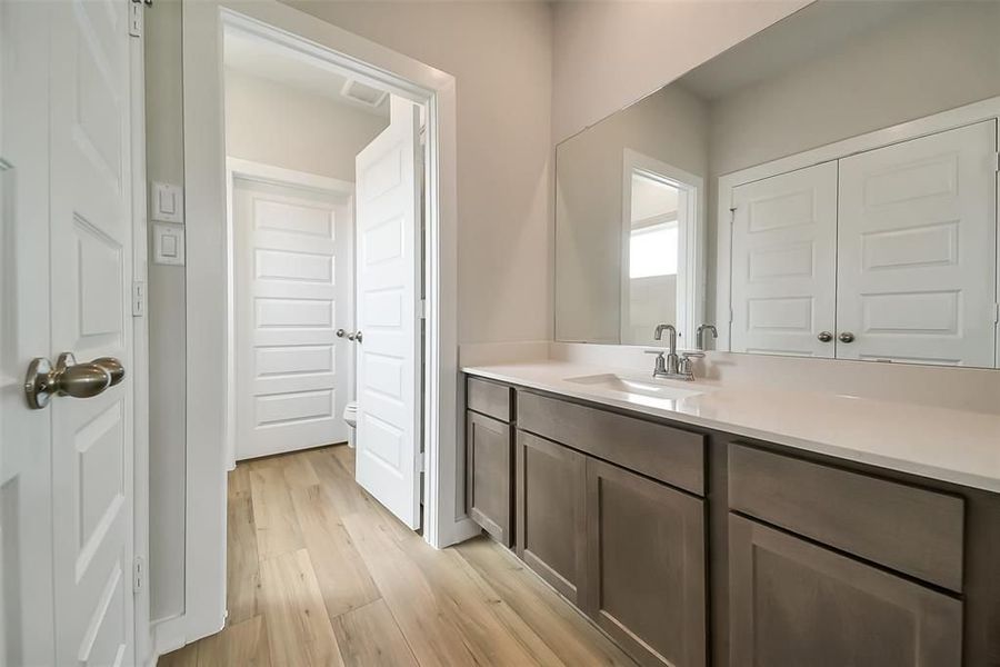 Furnished interior view inside a new home in Sunterra, Katy (Image 47).