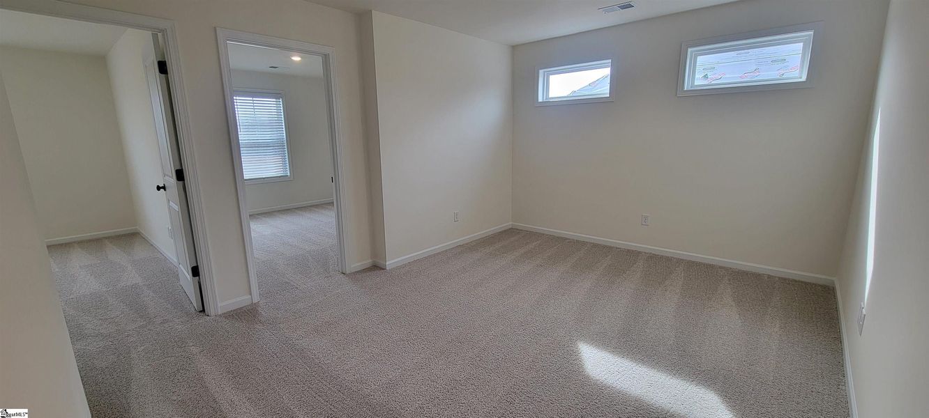 Spacious, unfurnished interior of a new home in Halton Oaks, Spartanburg (Image 29).