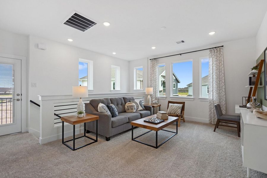 Furnished interior view inside a new home in Bridgeland Courtyard, Cypress (Image 4).