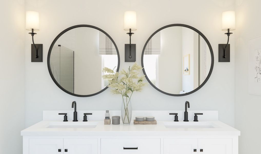 Primary bath with two-round framed mirrors