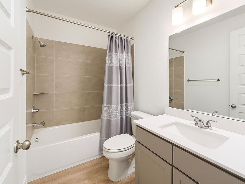 Furnished interior view inside a new home in Bridgeland 45', Cypress (Image 10).