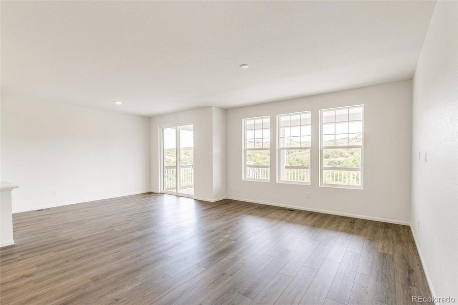 Spacious, unfurnished interior of a new home in Terrain Oak Valley, Castle Rock (Image 31).