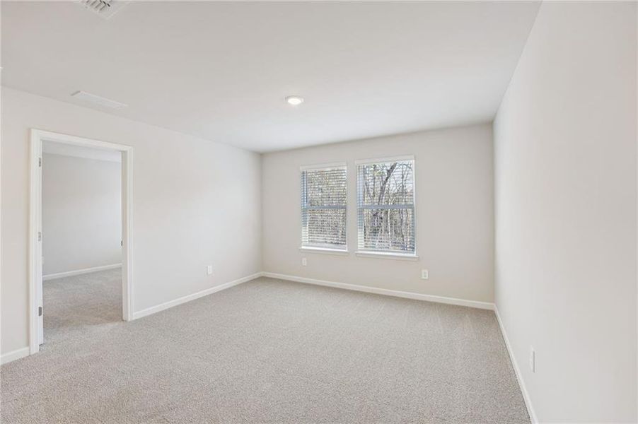 Spacious, unfurnished interior of a new home in Creekside at Oxford Park, Fairburn (Image 28).