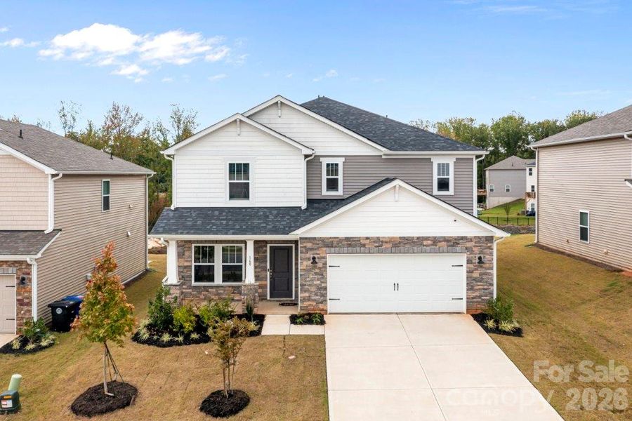 Front exterior of a new home in Shepherds Landing, Mooresville, NC, highlighting curb appeal (Image 19).