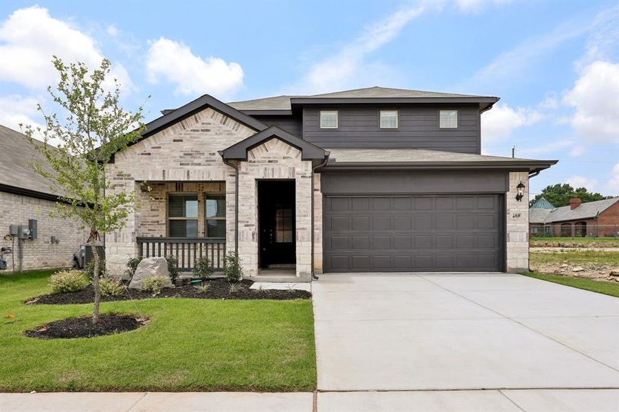 Front exterior of a new home in Westmoor, Sherman, TX, highlighting curb appeal (Image 23).