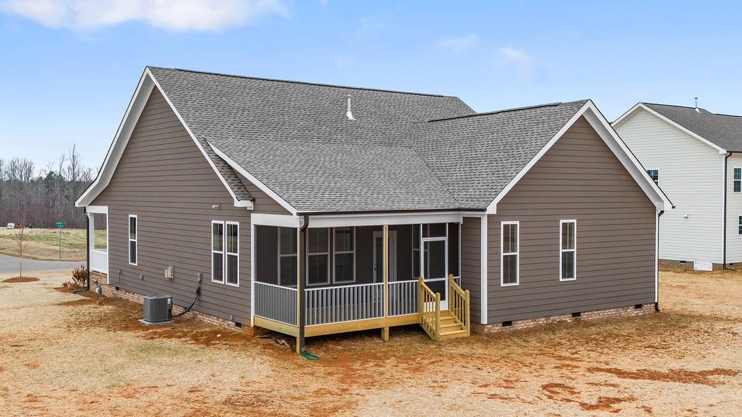 Exterior details and patio area of a home in Lilah Grove, Summerfield (Image 27).