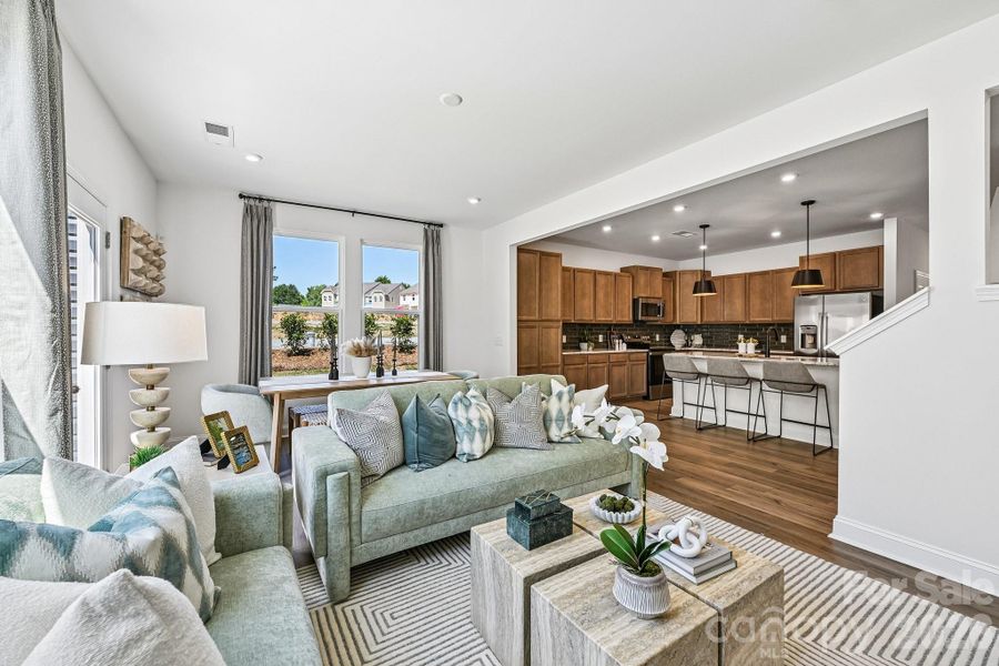 Model Home - Living Area & Kitchen. Model Home - Living Area & Kitchen.