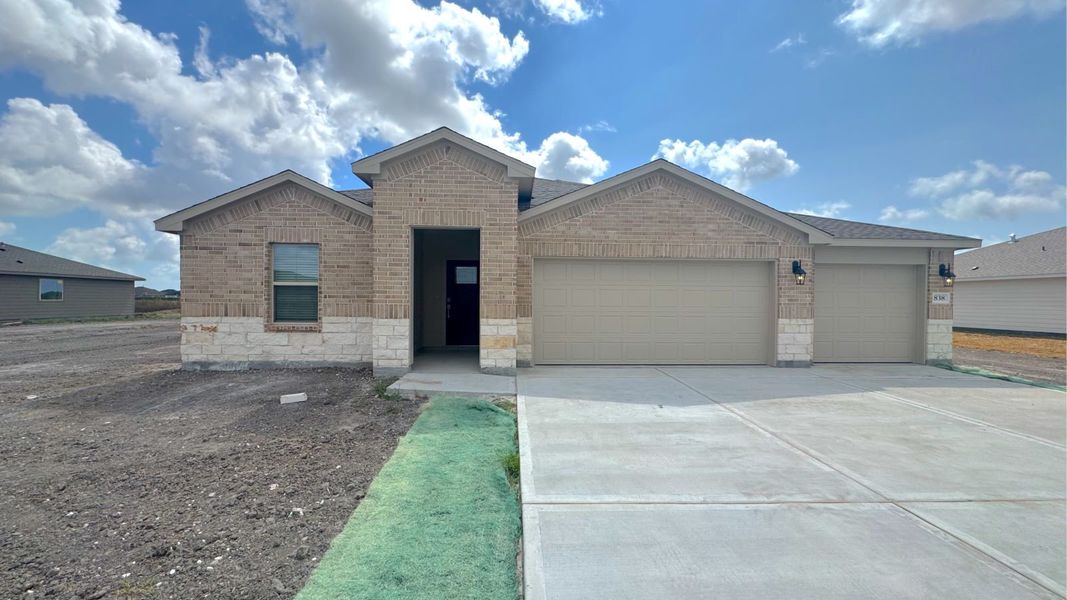 Front exterior of a new home in The Reserve at London, Corpus Christi, TX, highlighting curb appeal (Image 2). Front exterior of a new home in The Reserve at London, Corpus Christi, TX, highlighting curb appeal (Image 2).