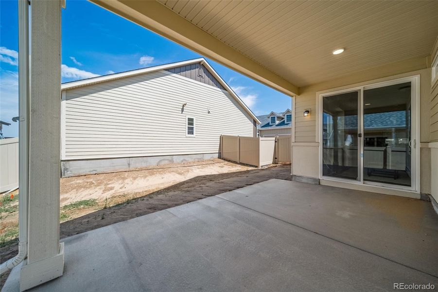 Exterior details and patio area of a home in The Reserve, Aurora (Image 3).
