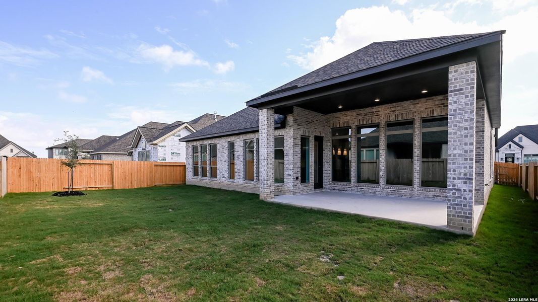 Exterior details and patio area of a home in Meadows of Mill Creek, Seguin (Image 4). Exterior details and patio area of a home in Meadows of Mill Creek, Seguin (Image 4).