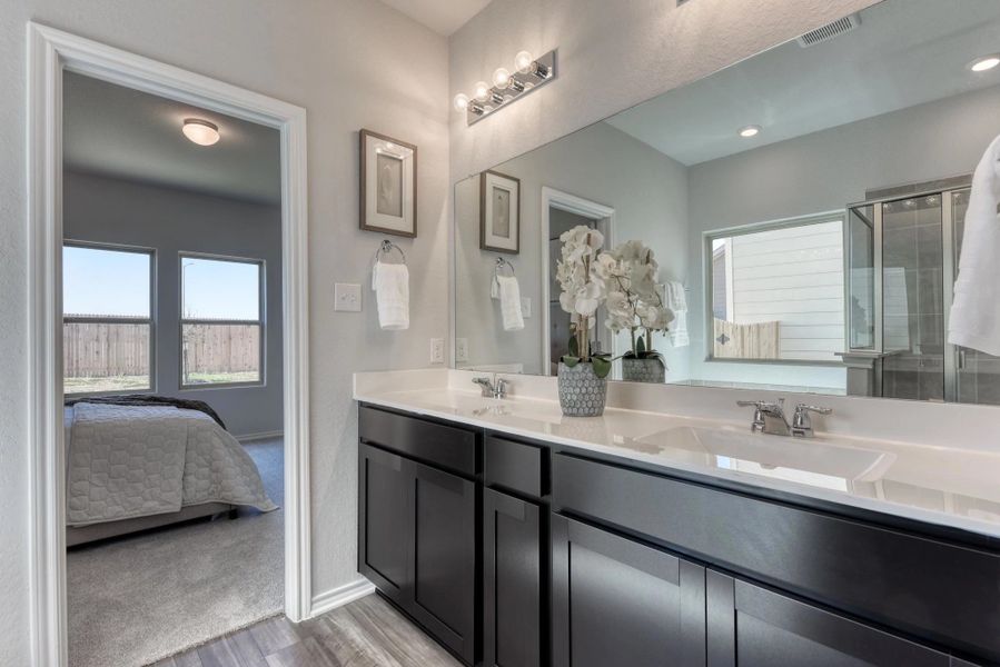 Representative furnished interior of a home built from the Ladybird by Ashton Woods in Meadows at Hennersby Hollow 40's, San Antonio (Image 10).