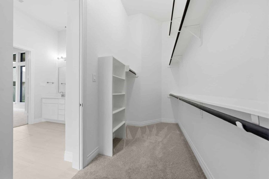 Furnished interior view inside a new home in Bridgeland 50′, Cypress (Image 11).