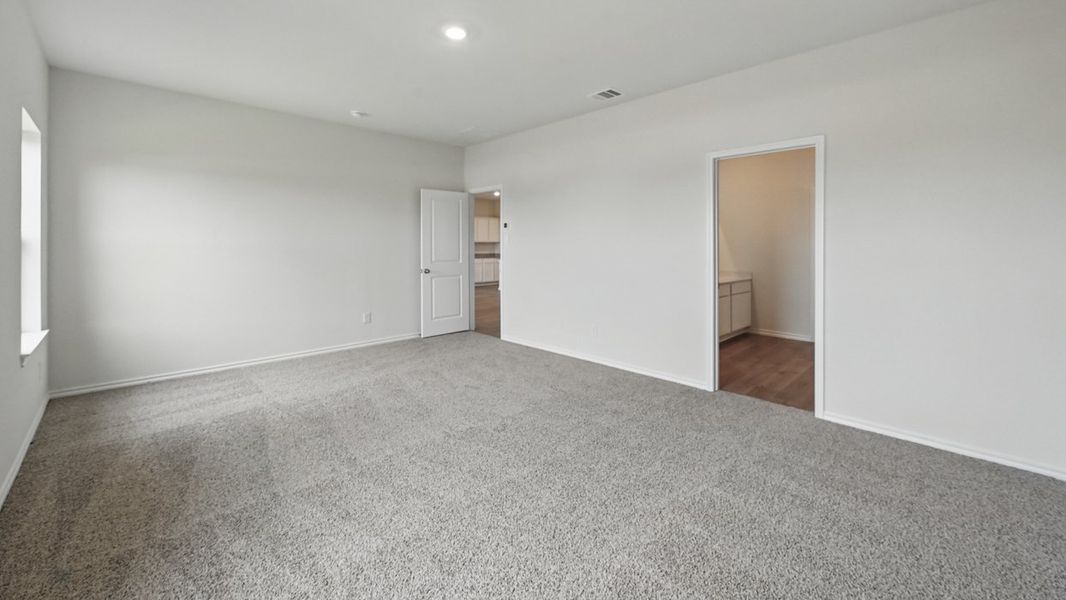 Representative unfurnished interior of a home built from the Ozark by D.R. Horton in Whitewing Trails, Princeton (Image 14).
