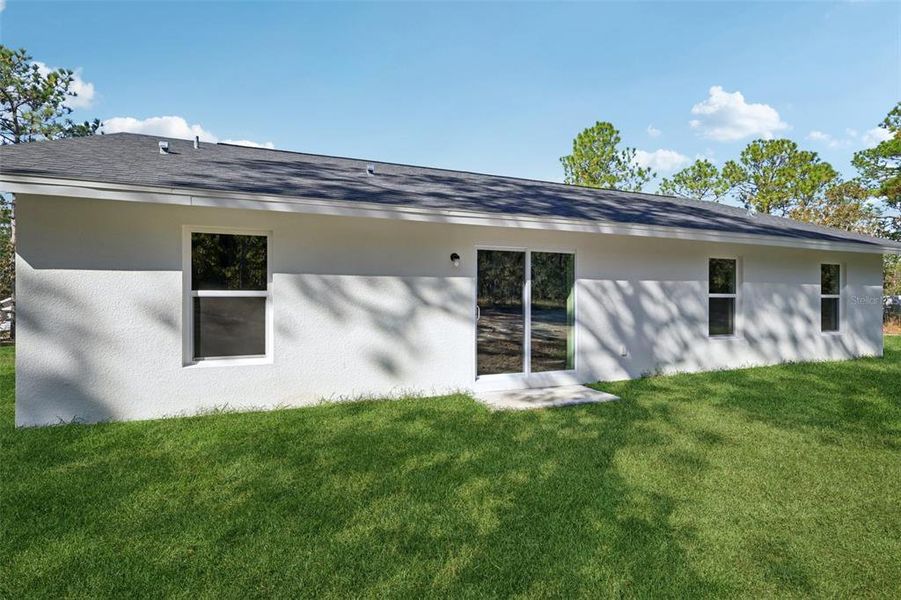 Exterior details and patio area of a home in , Brooksville (Image 21). Exterior details and patio area of a home in , Brooksville (Image 21).