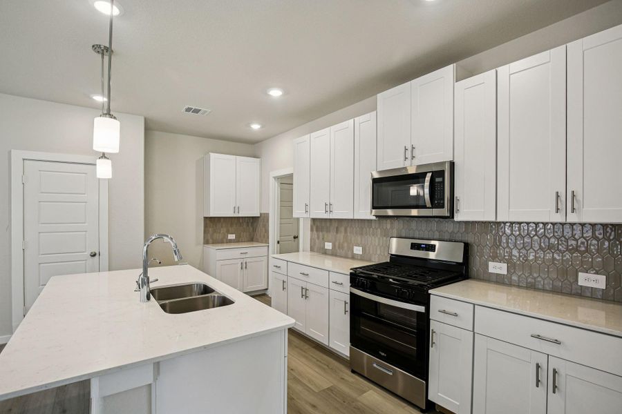 Photo is not of the actual home, but is an inspirational photo of builder’s model home and may depict options, furnishings, and/or decorator features that are not included