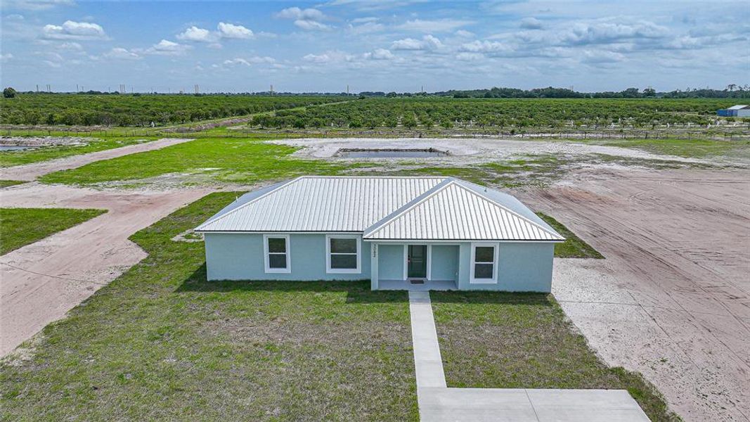 Front exterior of a new home in , Arcadia, FL, highlighting curb appeal (Image 24).