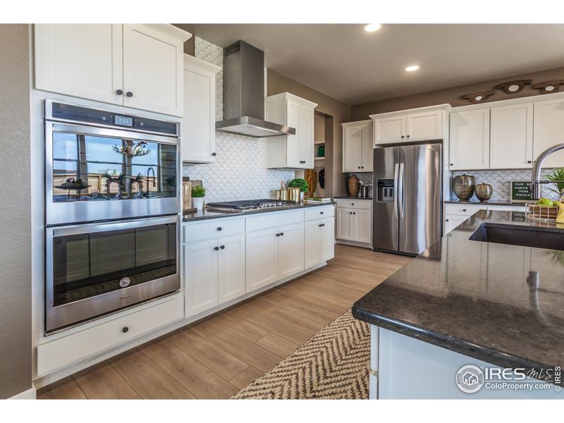 EXAMPLE PHOTO: KITCHEN W/ VINYL PLANK FLOORING