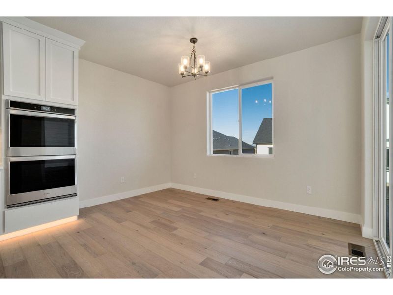 Dining Area Off Kitchen With Deck Access