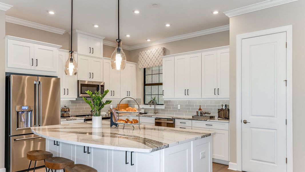 Furnished interior view inside a new home in Esplanade by the Islands Coach Homes, Naples (Image 3).