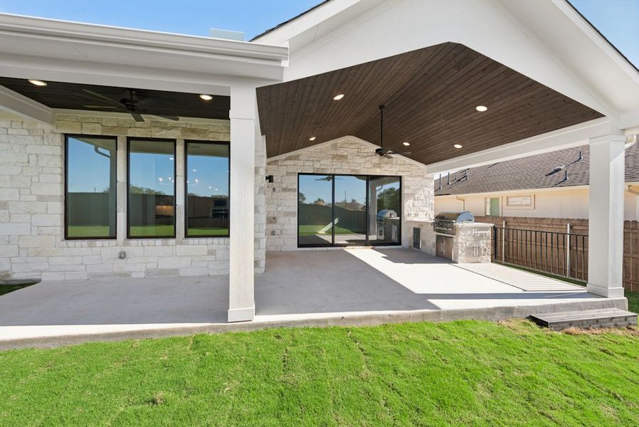 Exterior details and patio area of a home in Riverstone, Georgetown (Image 23).