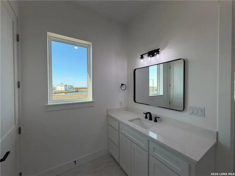 Furnished interior view inside a new home in , Port Aransas (Image 7).