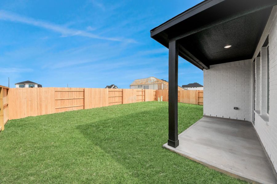 Exterior details and patio area of a home in Elyson, Katy (Image 4).