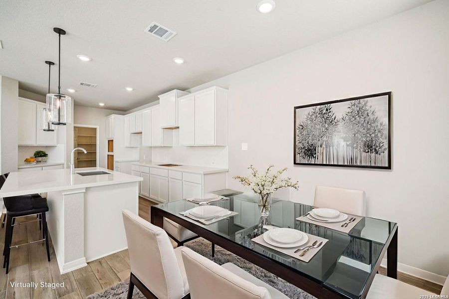 Furnished interior view inside a new home in Estancia Ranch - Classic Series, San Antonio (Image 8).