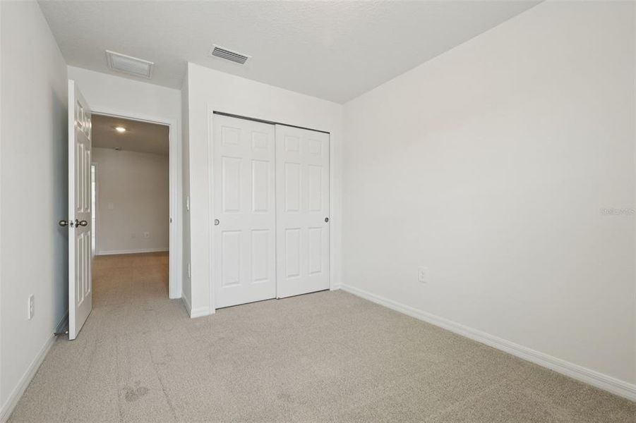 Spacious, unfurnished interior of a new home in Cagan Crossings West, Clermont (Image 28).