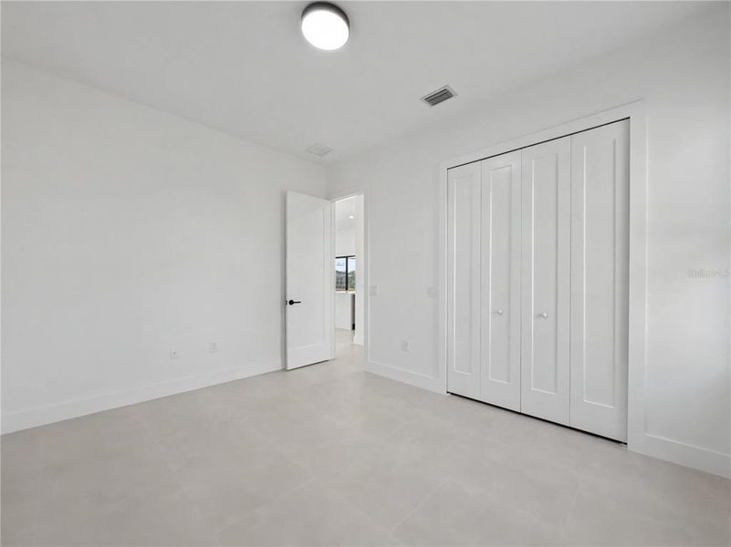 Spacious, unfurnished interior of a new home in , Port Charlotte (Image 25).