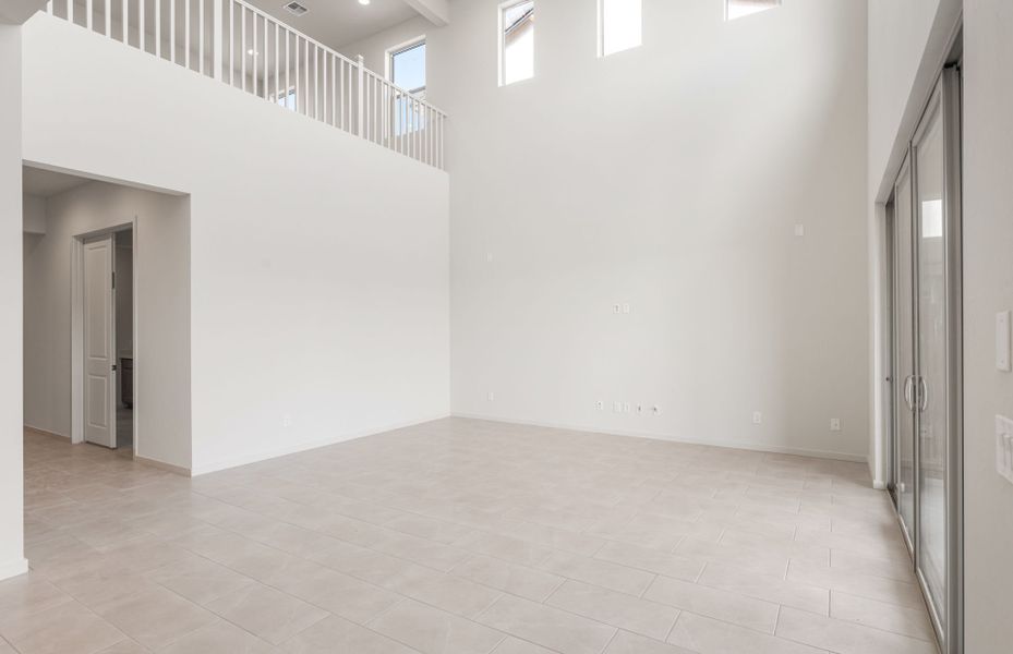 Spacious, unfurnished interior of a new home in Legado West, Queen Creek (Image 22).