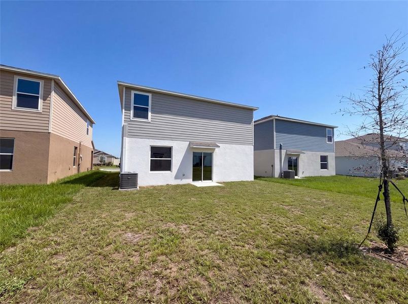 Exterior details and patio area of a home in Ranches at Lake Mcleod, Eagle Lake (Image 3).