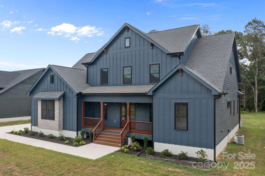 Front exterior of a new home in , Statesville, NC, highlighting curb appeal (Image 21).