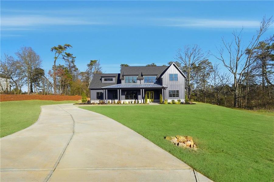 Front exterior of a new home in , Rydal, GA, highlighting curb appeal (Image 29).