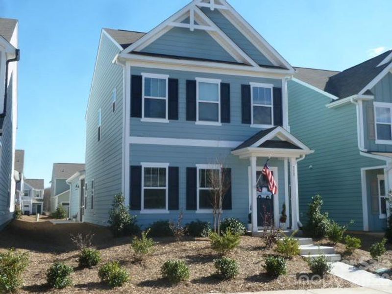 Front exterior of a new home in Wilkerson Place, York, SC, highlighting curb appeal (Image 2). Front exterior of a new home in Wilkerson Place, York, SC, highlighting curb appeal (Image 2).