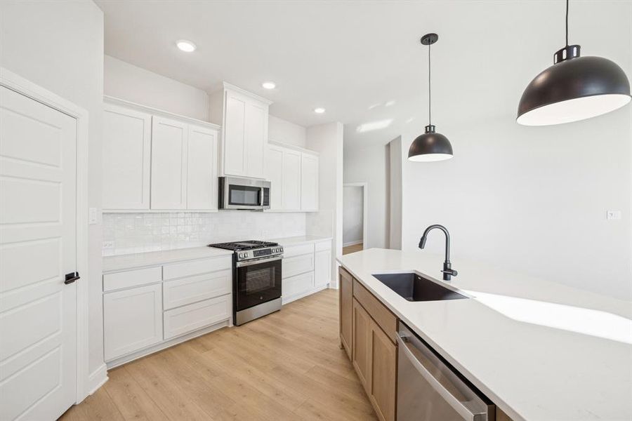 Furnished interior view inside a new home in Creekshaw – Classic, Royse City (Image 12).