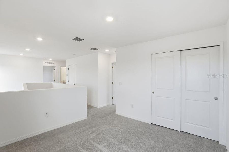 Spacious, unfurnished interior of a new home in Waterstone, Groveland (Image 23).