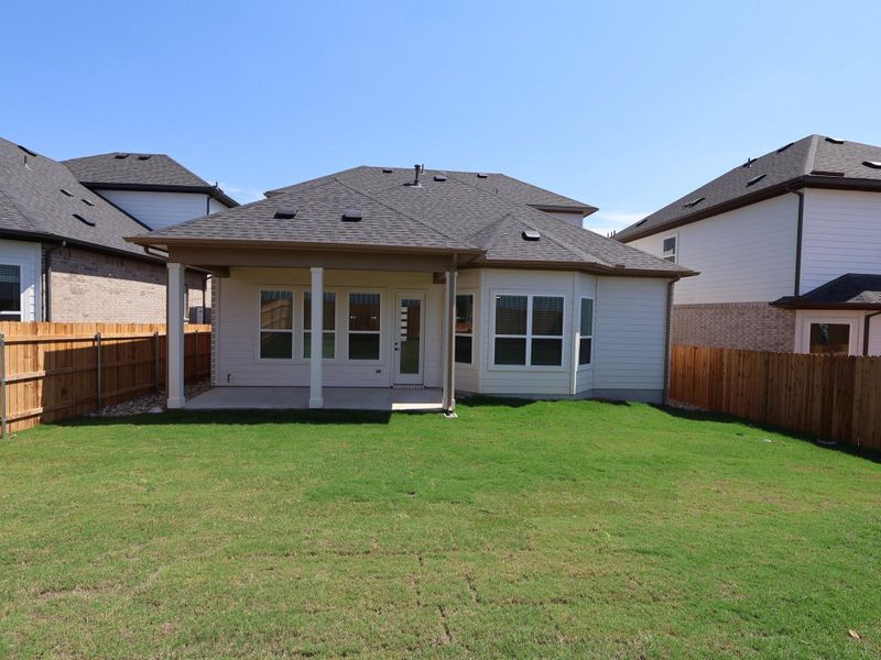 Exterior details and patio area of a home in Edgewood, Leander (Image 3).