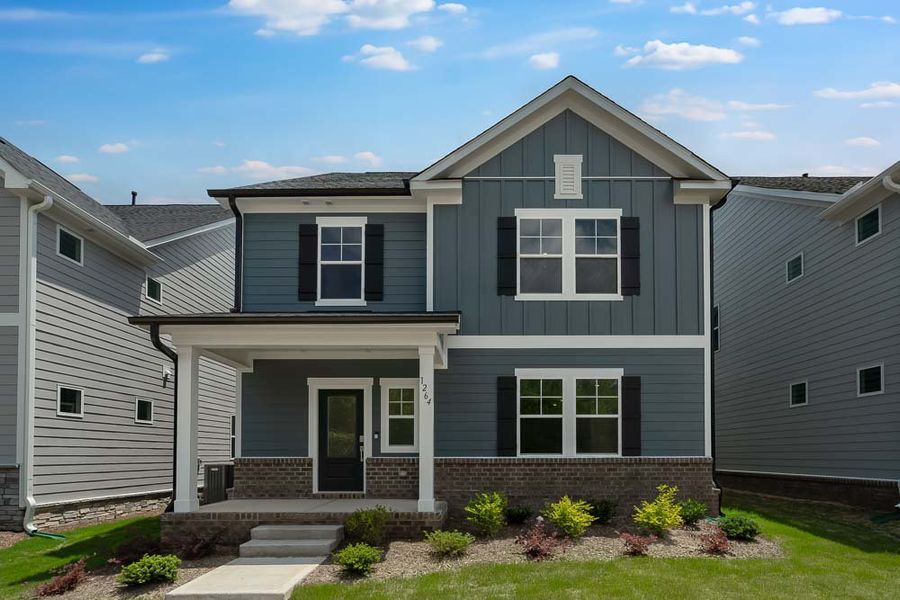 Representative exterior photo of a completed home built from the Augusta by Taylor Morrison in Silverstone, Knightdale, NC (Image 16).