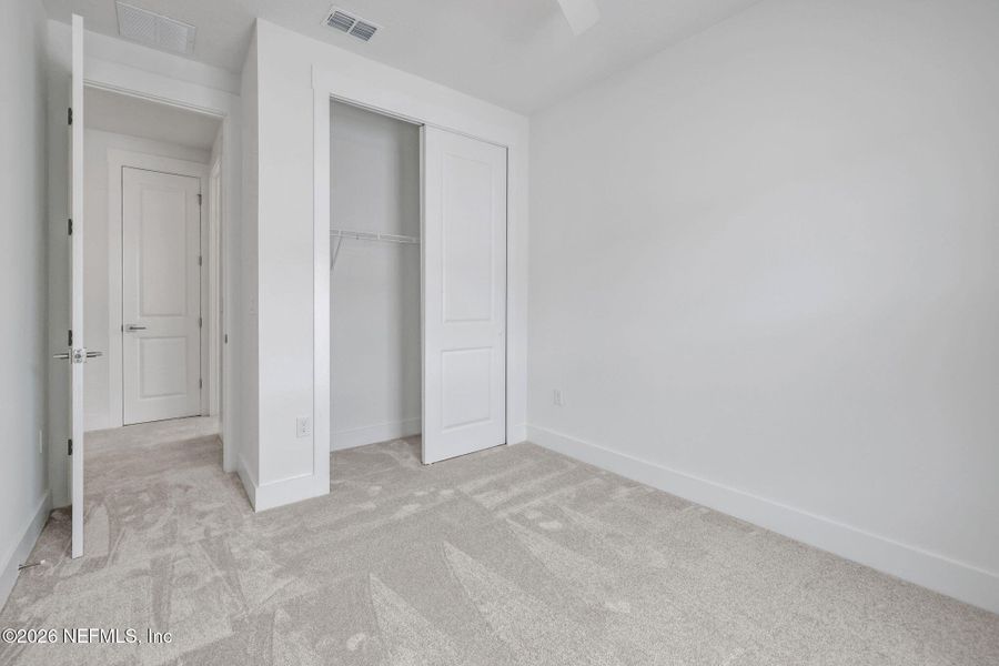 Spacious, unfurnished interior of a new home in North Beach Townhomes, Jacksonville Beach (Image 27).