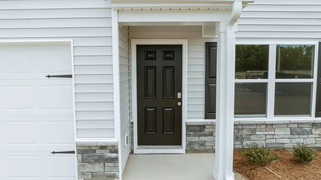 Exterior details and patio area of a home in Hunter Hill, Rocky Mount (Image 3).
