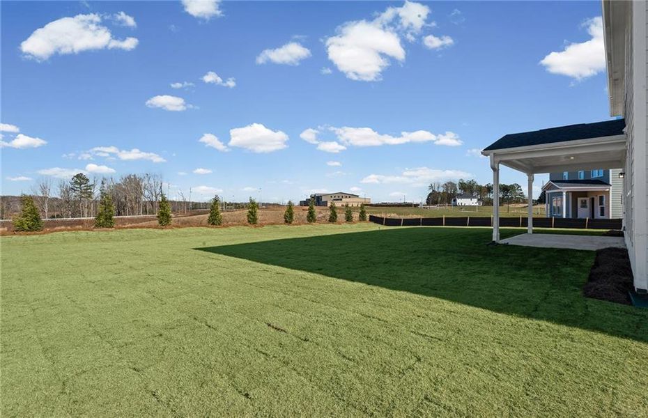 Exterior details and patio area of a home in Creekside at Skelton, Jefferson (Image 22).