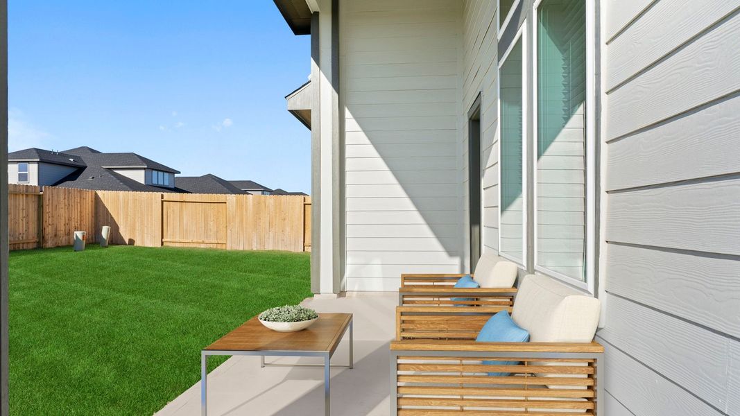 Exterior details and patio area of a home in Blue Heron Estates, Beasley (Image 2).